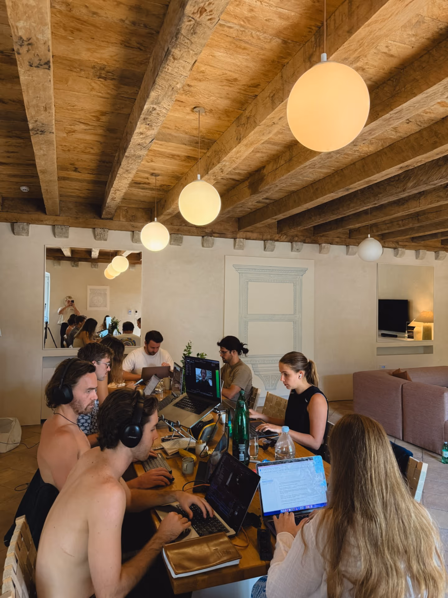 Co-working session under rustic beamed ceilings